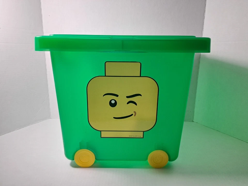 Estuche de almacenamiento LEGO 2012 verde rodante 4 ruedas diseño de cara guiñante buen estado Foto 1 de 4