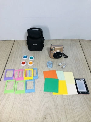 Fujifilm Instax Mini 70 Gold Instant Camera With Case And Rechargeable Batteries - Image 1 of 4