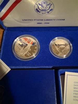 1986 US Liberty Proof Coin Set Statue of Liberty Silver Dollar Half Dollar Box - Image 1 of 2