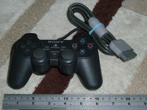 SONY PLAYSTATION 1 PS1 OFFICIAL DUALSHOCK ANALOG CONTROLLER Black Pad SCPH-1200 - Picture 1 of 1