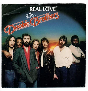 45rpm ' DOOBIE BROS. REAL LOVE ' M- / VG+ PIC SLEEVE '  ROCK - Picture 1 of 4