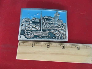 539. 1979 INSTYLE Silver Belt Buckle Seashore Lighthouse Sailboat Bird Water - Picture 1 of 4