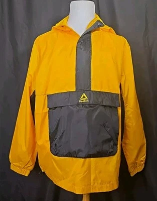 Cortavientos para hombre talla S Reebok dorado y negro. Chaqueta con capucha 1/4 cremallera forrada de malla Foto 1 de 4