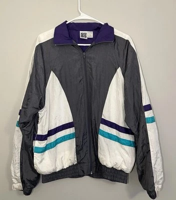 Chaqueta cortavientos Active Wear para hombre gris y púrpura de colección Foto 1 de 4