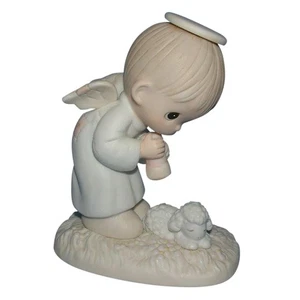 Precious Moments Figurine: PM841 God's Ray of Mercy (4.7") - Picture 1 of 3