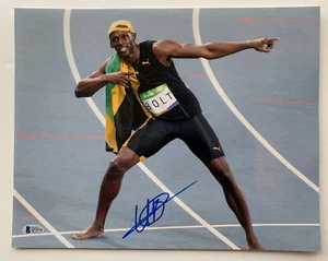 Usain Bolt Autographed 14 x 11 Photo Signed sprinter gold medal Beckett BAS coa - Picture 1 of 2