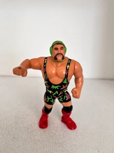 FIGURA DE JUGUETE DE ACCIÓN DE LUCHA LIBRE WWE RICK STEINER HASBRO WWF SERIE 9 1994 EN MUY BUENA CONDICIÓN - Imagen 1 de 6