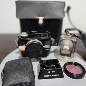 Cámara submarina Nikonos II de 35 mm + lente Nikkor 35 mm f/2,5 y flash sonónico - Imagen 1 de 12