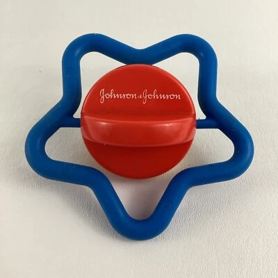 Johnson & Johnson спиннинг звезда погремушка детская игрушка винтажный красный желтый синий 1980-х - Изображение 1 из 4