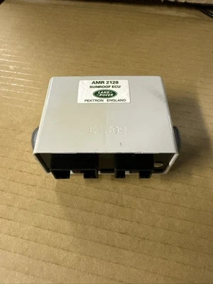 Unidad de control de ventana del motor techo corredizo ECU AMR2128 OEM Land Rover Discovery techo corredizo ECU Foto 1 de 4