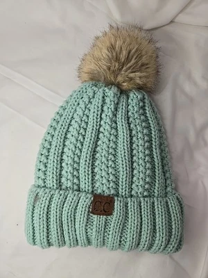 C.C Exclusive Women's Cable Knit Beanie Hat with Faux Fur  Pom, Winter Lined - Image 1 of 4