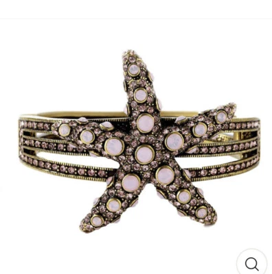 Brazalete con bisagras de cristal rosa claro HEIDI DAUS "Sea-ing Stars" M/L Foto 1 de 4