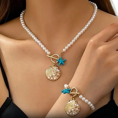 Damen  Seestern Imitat Perlen Halsband  Armband Charm Anhänger Türkis Gold Anker - Bild 1 von 4