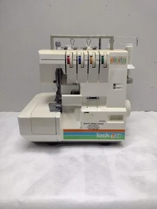 (J67) Elnita Lock T34 macchina da cucire + pedale / cavo di alimentazione - Foto 1 di 6