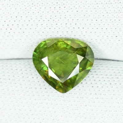 1.56 ct  DAZZLING  GLOW  MASSIVE  GREEN NATURAL  SPHENE / LIKE  Heart  6280 SY - Image 1 of 2