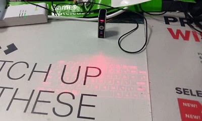 Epic Mobile BT Projection Keyboard-Working-Connects-Super HARD to Use-READ ALL - Image 1 of 4