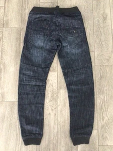 MENS ENZO DARK BLUE FADED COATED FASHION JOGGER JEANS BUTTON UP SIZE W32 - L32 - Picture 1 of 2