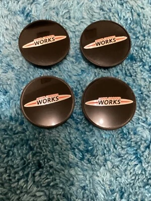 MINI TAPA CENTRAL # 3613-1171069 TAPA CENTRAL RUEDAS NEGRAS   Foto 1 de 4