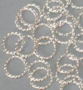 100 pezzi di anello di salto ritorto placcato argento 9 mm - Foto 1 di 2