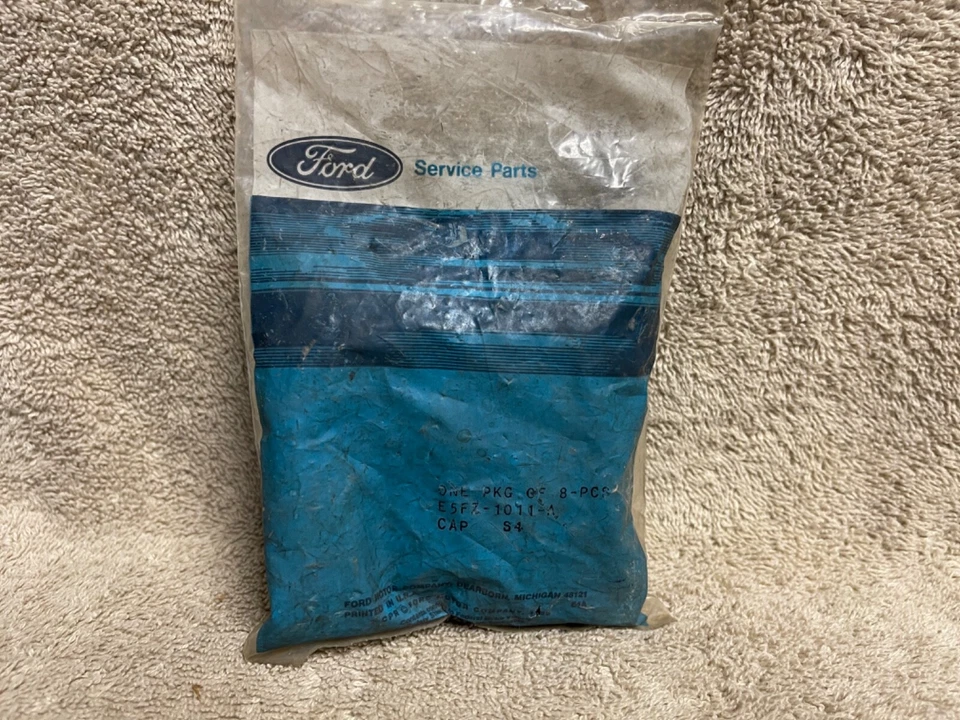 NUEVO DE LOTE FORD E5FZ-1011-A 1985-1989 ESCORT MERCURY LYNX TAPONES DE PERNOS DE RUEDA 8 PIEZAS Foto 1 de 4
