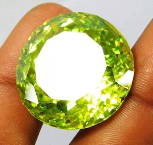 Piedra preciosa suelta corte redondo certificada AAA+ circón verde claro natural 95 quilates - Imagen 1 de 5
