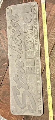 Antiguo letrero publicitario de aluminio en relieve Stan-Hoist Elevator FORT DODGE IOWA Foto 1 de 2