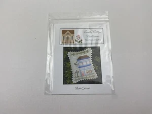 Country cottage Needleworks Main Street Art Gallery Counted Cross Stitch Pattern - Picture 1 of 3