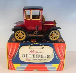 Schuco Nr.1228  Auto Rüttel Oldtimer Opel Doktorwagen 4/8 (1909) rot OVP #3194 - Bild 1 von 5