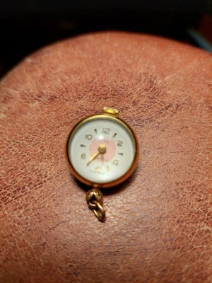 Antiguo reloj colgante bola hecho en Suiza. Esfera elegante tono oro 17 joyas Foto 1 de 4