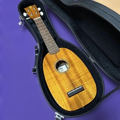 ILIKAI SOP-PINE4KGG 4-String Hawaiian Koa Ukulele with Case Wood Head - Image 1 of 4