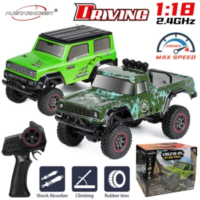 Camión de escalada todoterreno AUSTARHOBBY 4x4 2,4 G 3 canales radiocontrol Rock Crawler 1/18 coche RTR Foto 1 de 4
