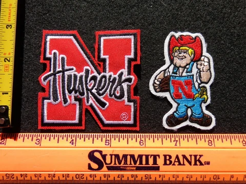 VINTAGE NCAA Nebraska Cornhuskers & Herbie Mascot Patches 2 Pc Lot / 3 Inch Cover