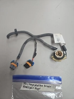 1997-2005 Chevrolet Malibu OEM driver side headlight Plugs - Image 1 of 4