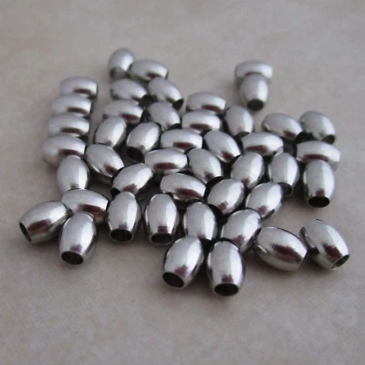 50 stainless steel beads 5mm x 4mm oval barrel hypoallergenic - Image 1 of 4