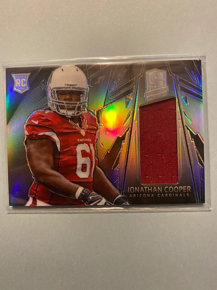A37,936 - 2013 Panini Spectra Rookie Materials #241 Jonathan Cooper Jersey/99 - Image 1 of 1