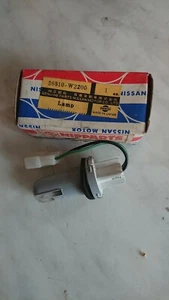 Datsun Bluebird 910, number plate lamp, saloon and hardtop models, new genuine. - Picture 1 of 3