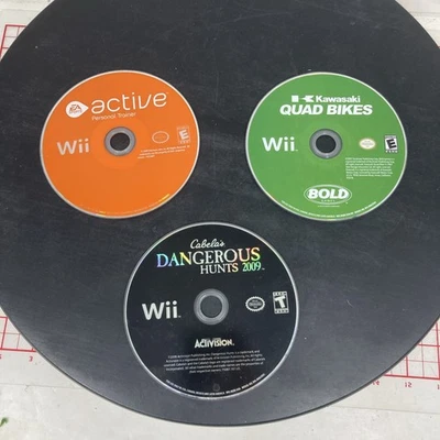Nintendo Wii Disc a lot of three Cabela’s dangerous hunts 2009 active Kawasaki - Image 1 of 4