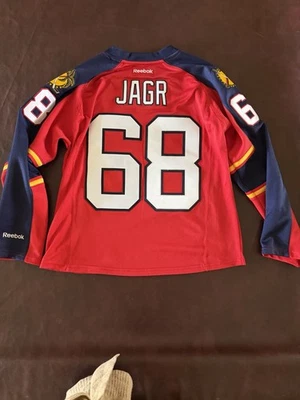 Camiseta de hockey Florida Panthers NHL #68 Jagr oficial Reebok cosida para mujer Lg Foto 1 de 4