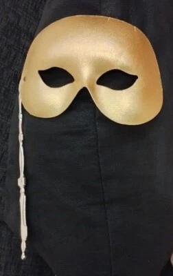 Máscara facial/ojos de arlequín dorada con mango de palo Foto 1 de 4