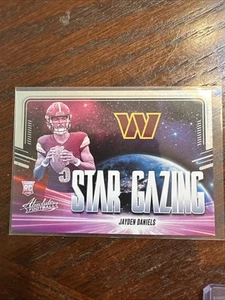 2024 Panini Assoluto - Star Gazing Jayden Daniels #SG-JDS (RC) - Foto 1 di 2