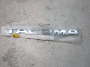 dp80407 Toyota Tacoma 2005 2011 2012 2013 2014 2015 Door nameplate emblem OEM - Picture 1 of 2