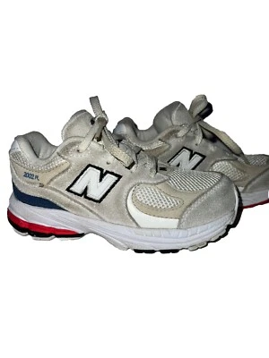 Zapatillas deportivas New Balance 2002R gris rojo blanco y azul bebé niño talla 10 Foto 1 de 4