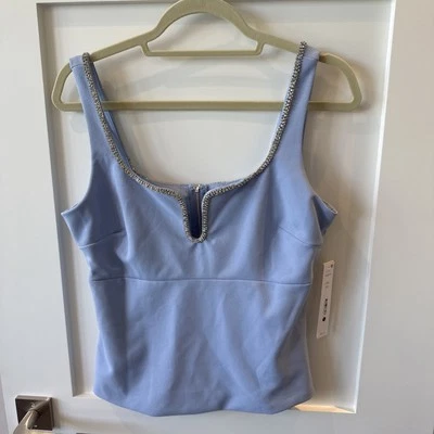 Top Aqua estrás nuevo con etiquetas talla M azul bebé Foto 1 de 4