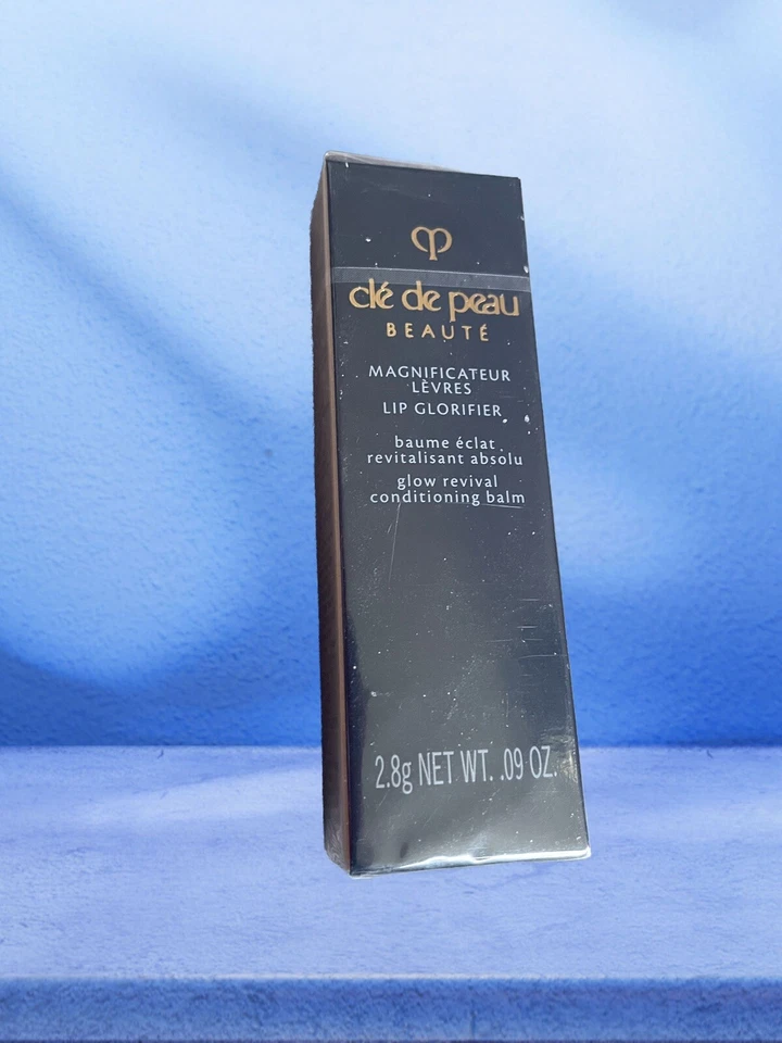 Glorificador de labios Cle de Peau Beaute N-rosa 2,8 g peso neto. .09 OZ. Foto 1 de 1