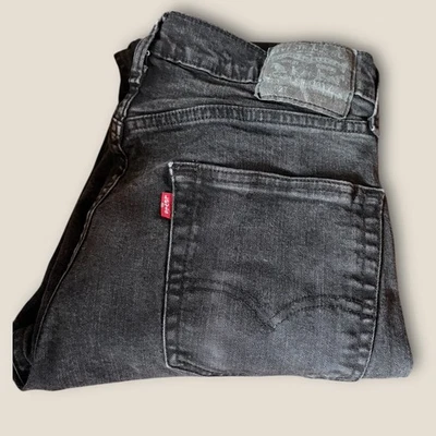 Pantalones de mezclilla Levi’s 527 Bootcut para hombre 33x34 negros desteñidos carbón elástico lengüeta roja Foto 1 de 4