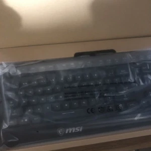 MSI Vigor GK20 GAMING Keyboard, Water Repellent, Static Multi-Color Backlit Keys - Picture 1 of 2