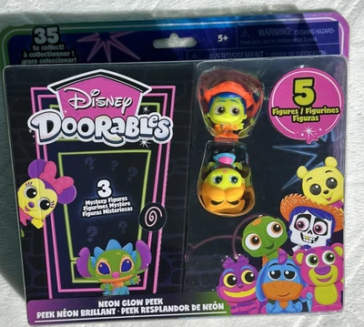 Disney Doorables Neon Glow Peek - Woody/Alicia - Más 3 Figuras Sorpresa Foto 1 de 4