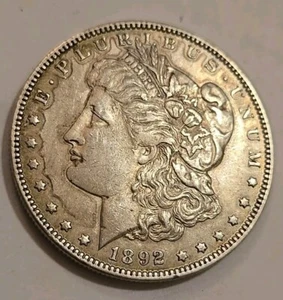 1892-O Morgan Silver $1 Dollar - Picture 1 of 4