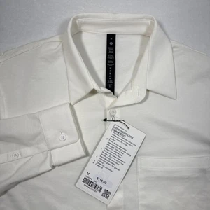 NUEVO CON ETIQUETAS Camisa Lululemon Commission Para Hombres M Vestido Abotonado Manga Larga Bolsillo Golf - Imagen 1 de 8