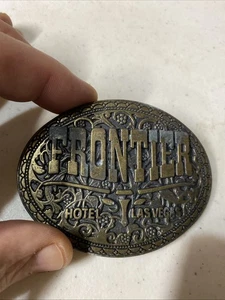 Vintage 1970’s Frontier Hotel Las Vegas Nevada Brass Belt Buckle - Picture 1 of 2